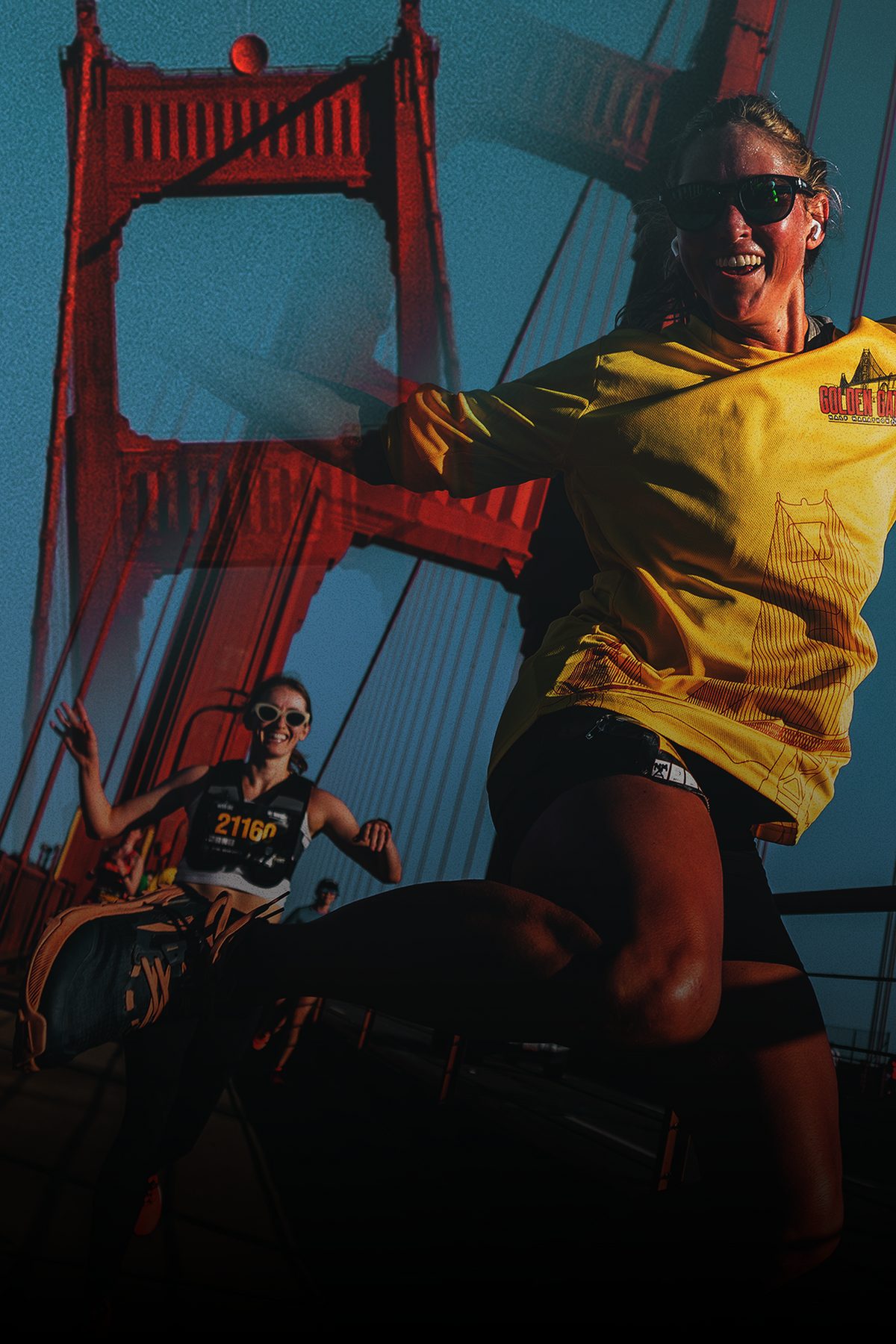 A finisher celebrating on the bridge